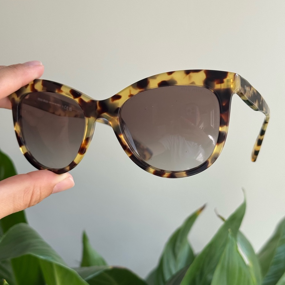 Miu Miu tortoise sunglasses